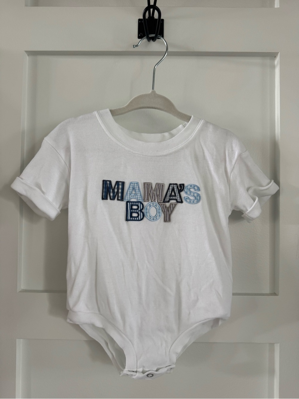 Never Worn! White "Mama's Boy" Baby Onesie